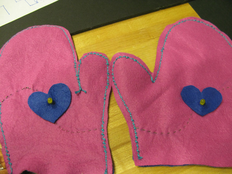 a pair of gloves for girls